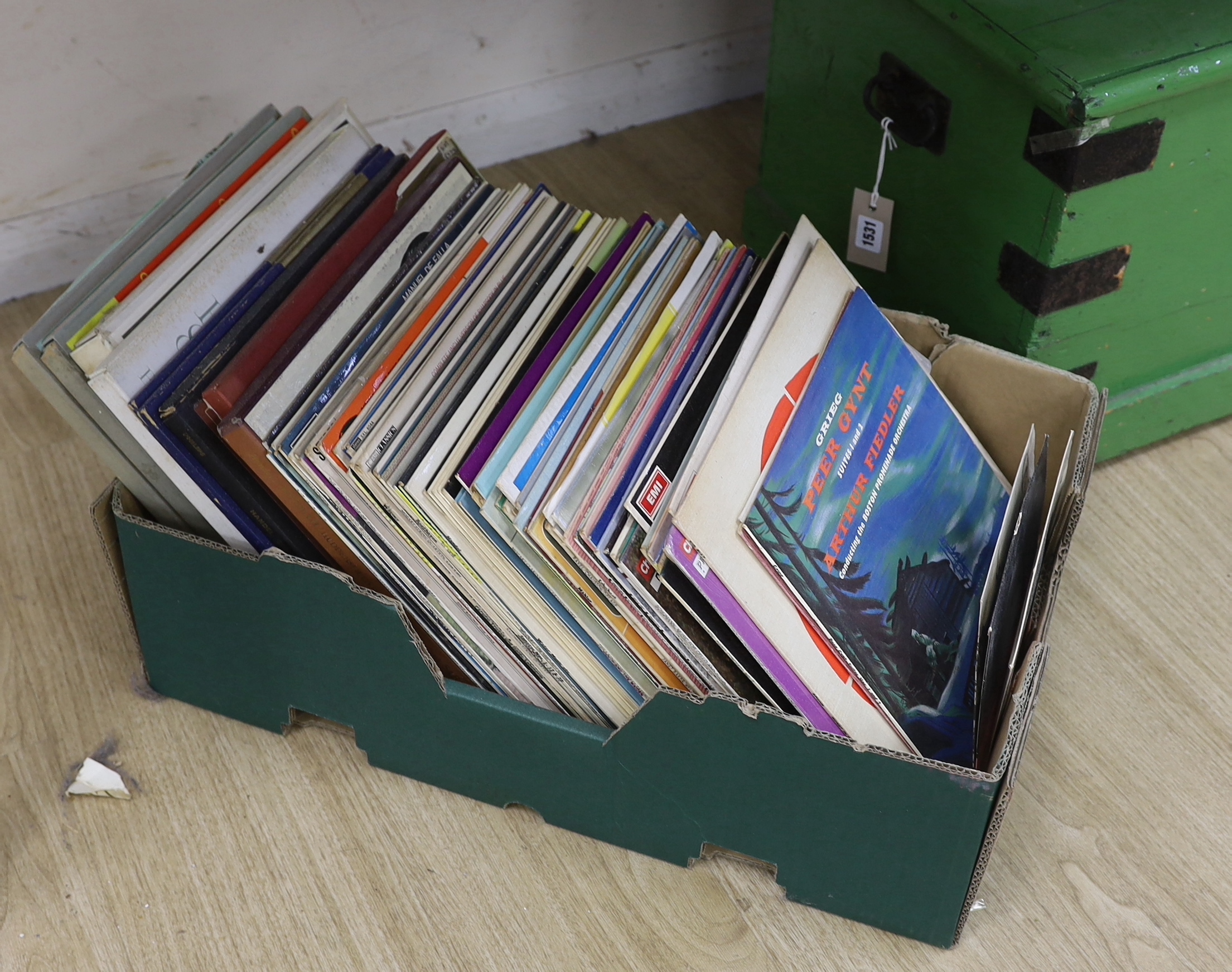 A large collection of jazz, classical and pop record albums and a green painted pine box